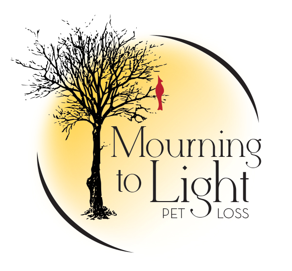 Logo for Mourning to Light Pet Loss, a circle with a drawing of a tree and a red bird perched on a branch.