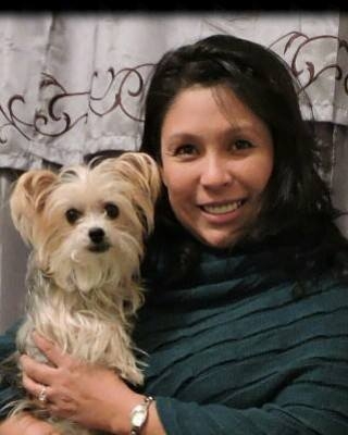 Oz Psychotherapy provider Jennifer Stephenson, LPC, and her small white dog, Doris