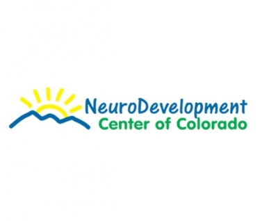 NeuroDevelopment Center of Colorado logo, with a drawing of the sun rising over the mountains