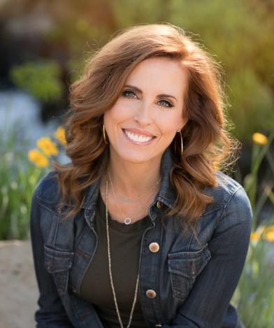 Alison Biggs, licensed professional counselor, outdoors in the sunshine, smiling