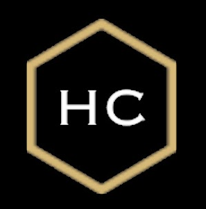 Logo for Healing Connections, a black background with the outline of a gold hexagon in the center with the letters HC in white inside