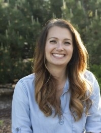 Photo of Mackenzie Howshar, LMFT, outdoors, smiling
