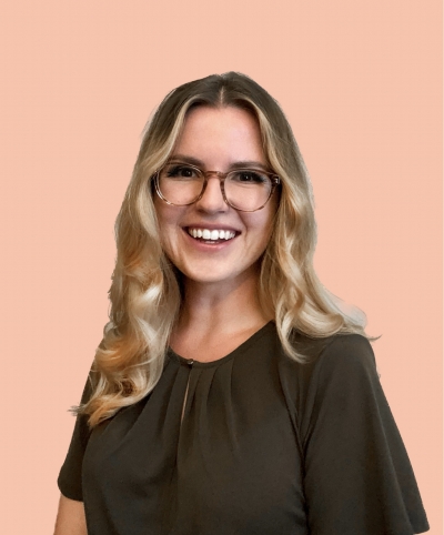 Christina Sladkowski, licensed professional counselor, smiling, wearing glasses