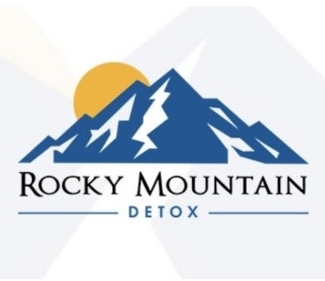 Rocky Mountain Detox logo, drawing of a mountain with an orange sun behind it