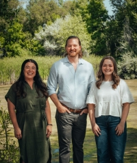 Ann Purves, Chris Pelletier, and Avery Saucerman standing together outdoors 