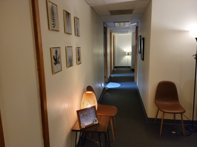 Office area and view down hallway from the lobby