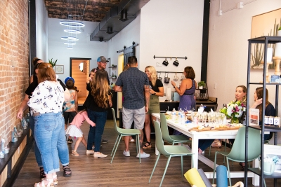 A group of people mingling at an IOME event