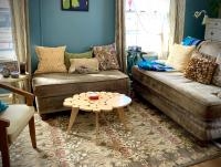 SoulFire Healing Arts office with sofas and chair, and large windows