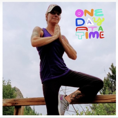 Practicing yoga outdoors taking one day at a time