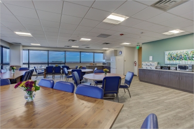 EDCare's spacious dining room with beautiful views of the Denver skyline.