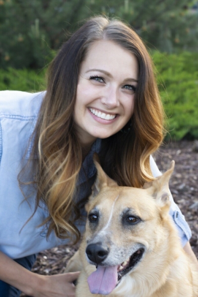 Photo of Mackenzie and August, the therapy dog