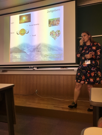 Natalie Rolle giving a presentation in Japan in 2018
