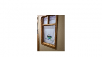 Window with welcome sign.